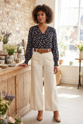 Chic Navy Floral V-Neck Blouse with Smocked Cuffs – Size 36